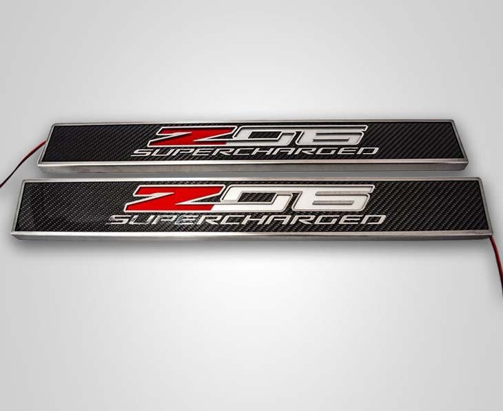 Light Gray 2014-2019 C7 Corvette - Light Up Z06 SUPERCHARGED Replacement Door Sills 2Pc - Carbon Fiber w/Stainless Trim